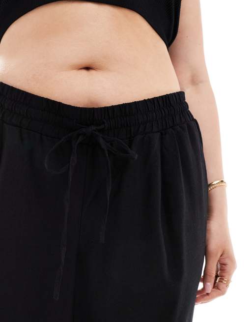 Pantalones negros de corte tapered de mezcla de lino de Vero Moda Curve, 5 de 5