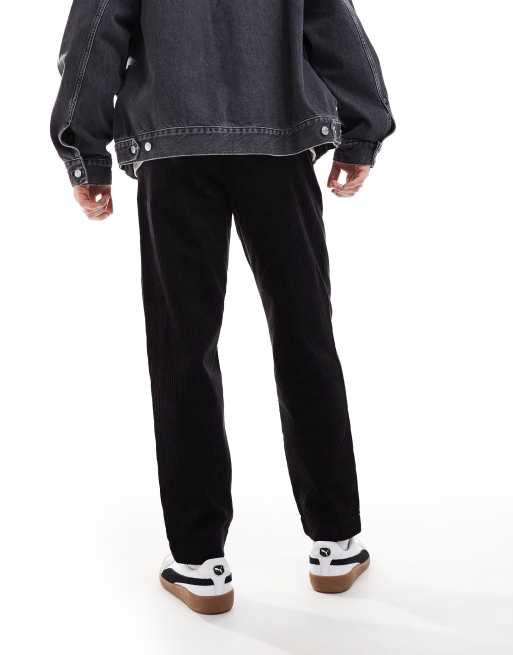 Pantalones negros de corte tapered de pana de Fred Perry, 5 de 5