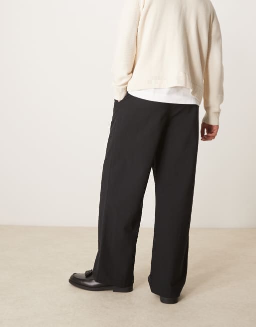 Pantalones negros de corte tapered extragrande de mezcla de lino y algodón de ASOS DESIGN, 3 de 5