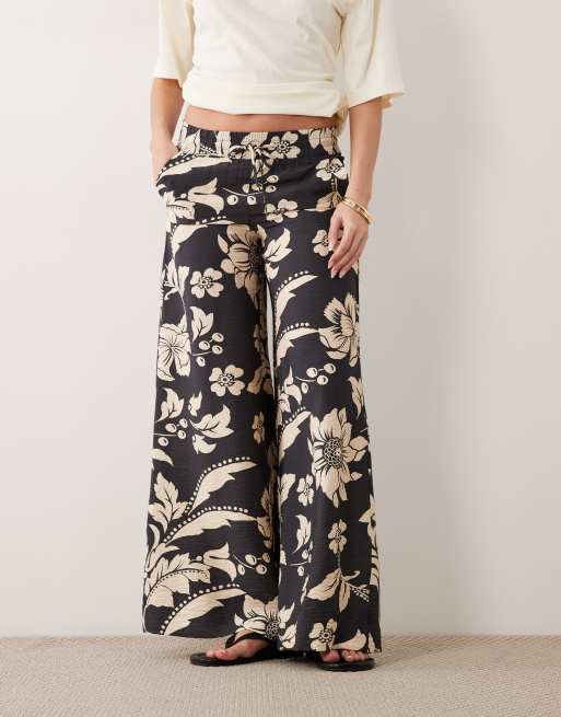 Pantalones negros de pernera ancha con estampado floral color crema de JDY, 2 de 5
