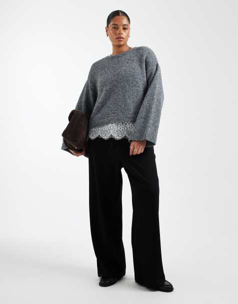 Pantalones negros de pernera ancha con lazada en la cintura de punto liso de Vero Moda Curve - view 1