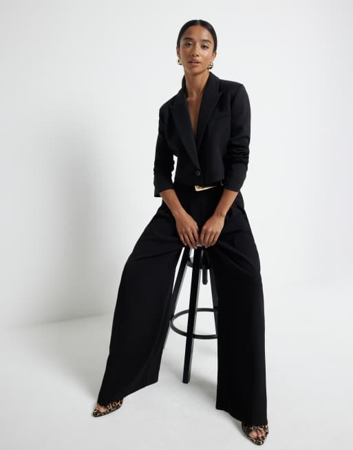 Pantalones negros de pernera ancha con pinzas de River Island Petite, 3 de 3