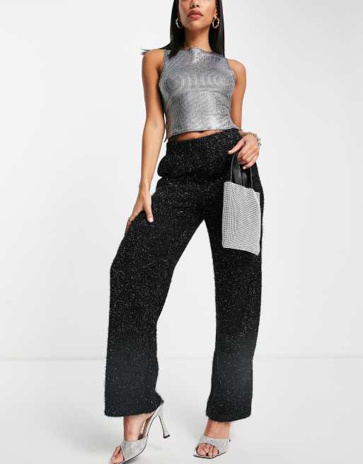 Pantalones negros de pernera ancha con purpurina de tejido mullido de Vero Moda