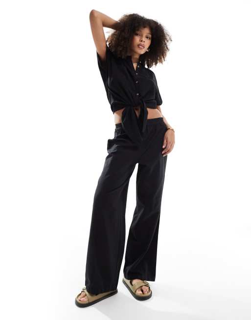 Pantalones negros de pernera ancha con tacto efecto lino de PIECES (parte de un conjunto)
