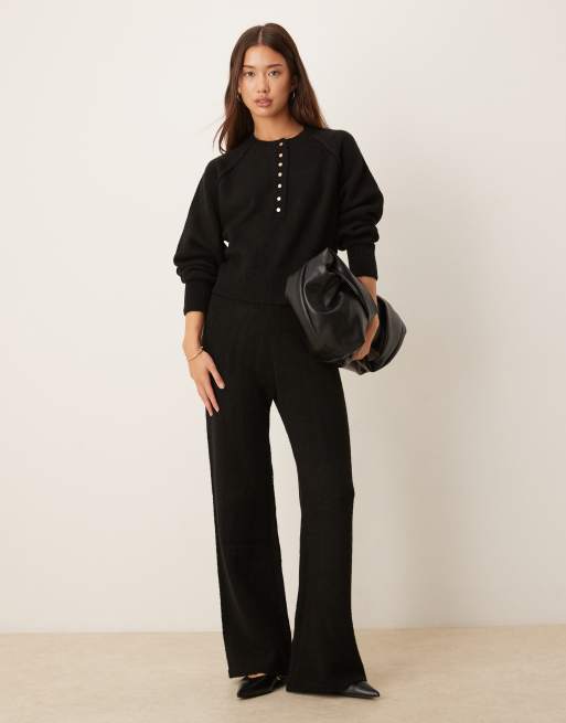 Pantalones negros de pernera ancha de punto de ASOS DESIGN