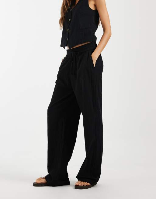 Pantalones negros de pernera ancha de tejido efecto lino de ONLY, 2 de 5