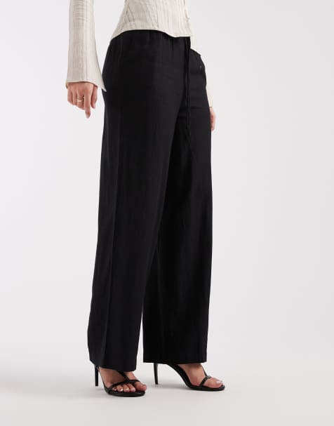 Pantalones negros de pernera ancha de tejido efecto lino de River Island (parte de un conjunto) - view 1