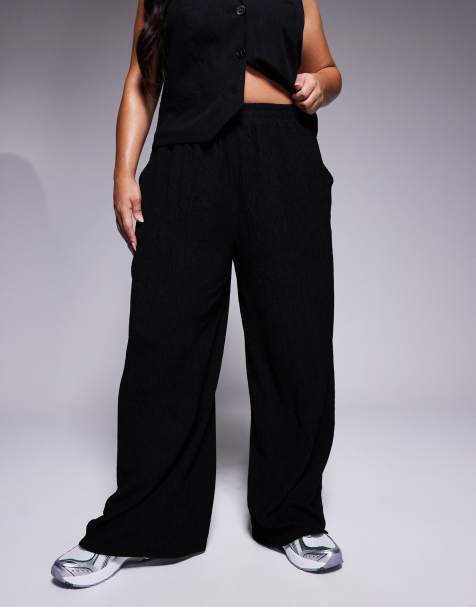 Pantalones negros de pernera ancha de tejido texturizado de ASOS DESIGN Curve - view 1