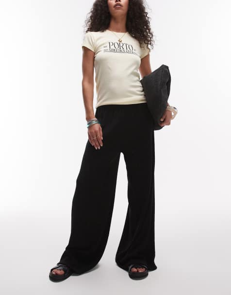 Pantalones negros de pernera ancha de tejido texturizado de Topshop - view 1