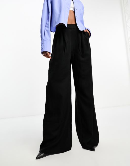 Pantalones negros de pernera ancha sin pinzas en la parte delantera de ASOS DESIGN Tall , 4 de 4