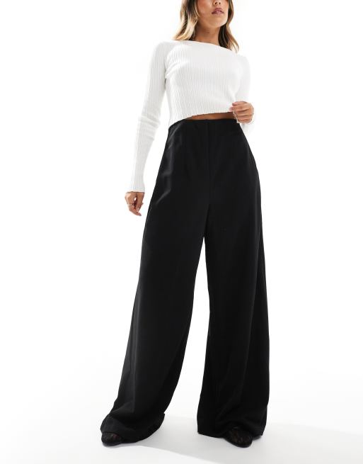 Pantalones negros de pernera muy ancha de punto de crepé de Vero Moda