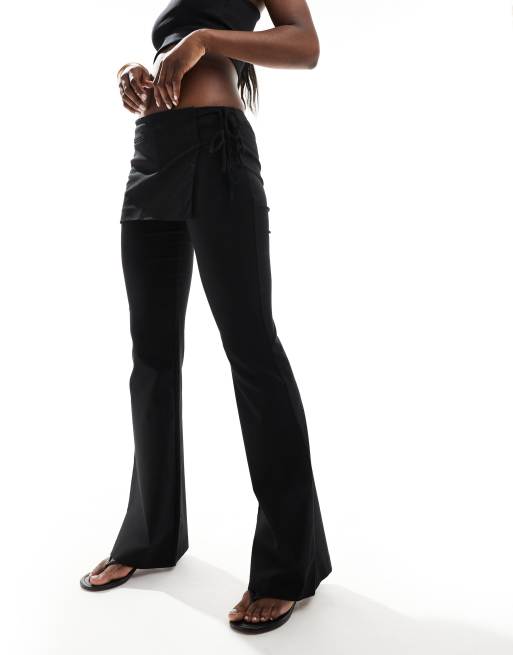 Pantalones negros de pernera recta con lazada lateral de Mango
