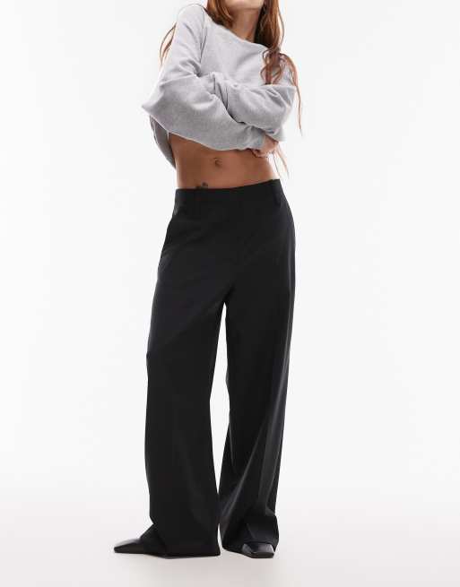 Pantalones negros de pernera recta con parte delantera lisa de mezcla de lana elástica de ARKET