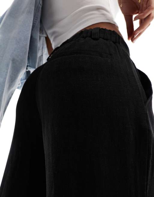 Pantalones negros de pernera recta holgada de mezcla de lino de ASOS DESIGN , 4 de 5