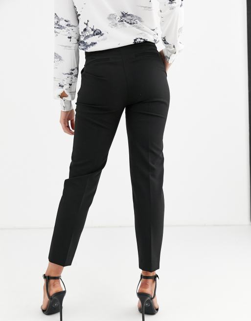 Pantalones negros de pernera slim de Warehouse, 2 de 4