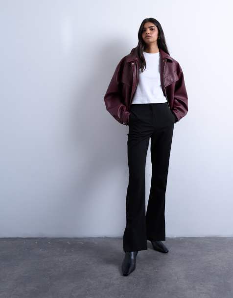 Pantalones negros de talle alto y corte acampanado con abertura de Topshop - view 1