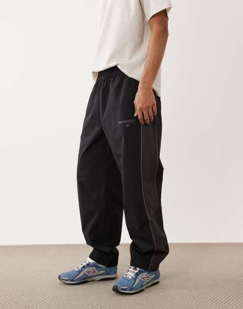 Pantalones negros de tejido liso Trackside de New Balance - view 1