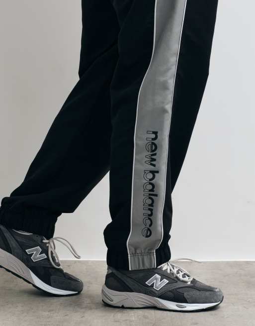 Pantalones negros de tejido liso Trackside de New Balance, 4 de 5