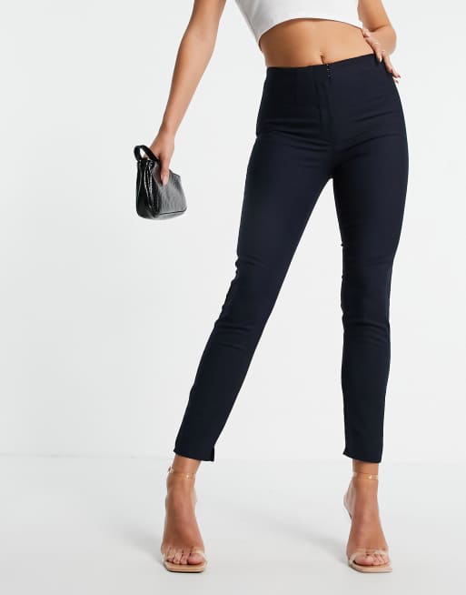 Pantalones negros elásticos de Mango