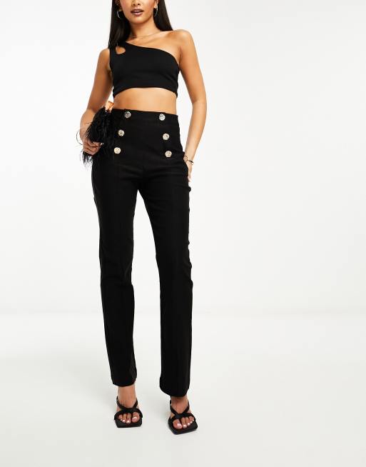 Pantalones skinny negros rock botones presión mujer