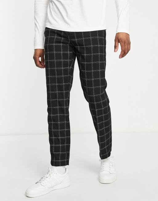 Pantalones negros holgados a cuadros de River Island, 3 de 4