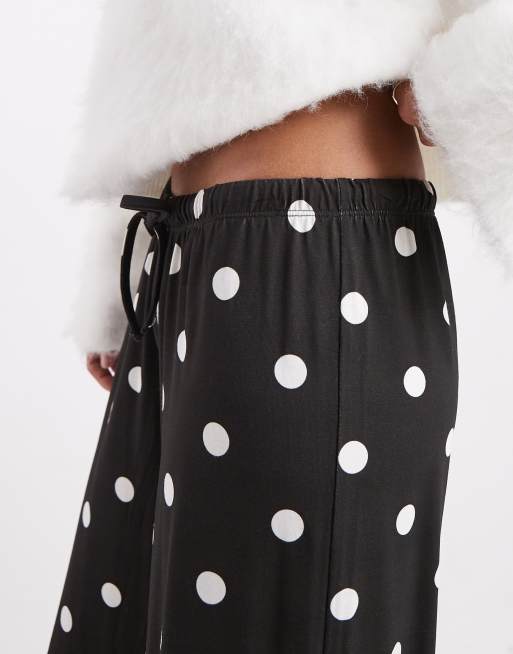 Pantalones negros holgados con estampado de lunares blancos de canalé de COLLUSION, 2 de 5