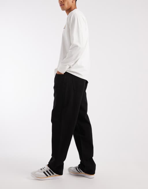 Pantalones negros holgados con pinzas de ASOS DESIGN, 2 de 5