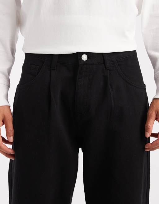 Pantalones negros holgados con pinzas de ASOS DESIGN, 4 de 5