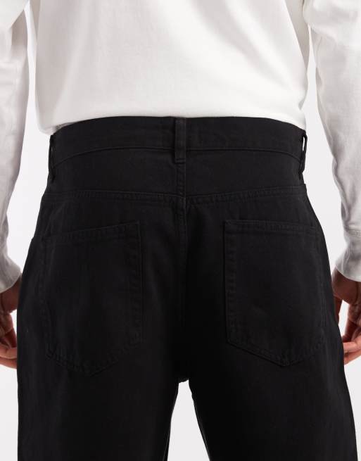 Pantalones negros holgados con pinzas de ASOS DESIGN, 5 de 5