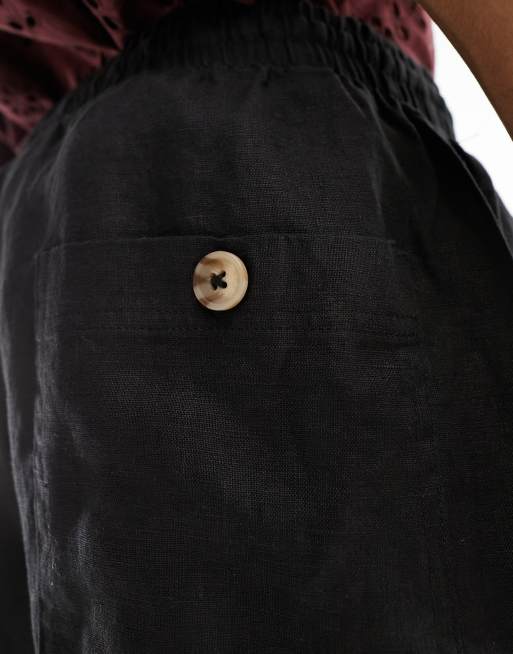 Pantalones negros holgados de pernera recta de lino de Cotton On , 5 de 5