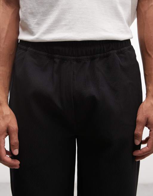 Pantalones negros holgados plisados Troy de Pegador, 5 de 5