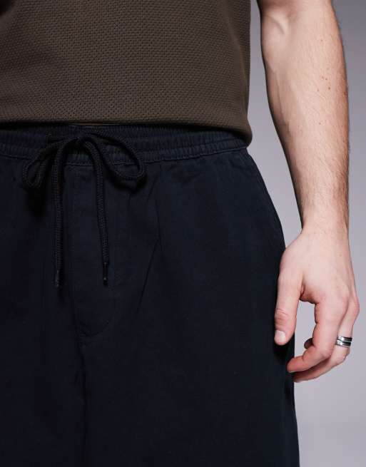 Pantalones negros holgados y extragrandes con cintura elástica de ASOS DESIGN , 3 de 5