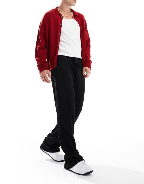 Pantalones negros muy holgados de punto de ASOS DESIGN - view 1
