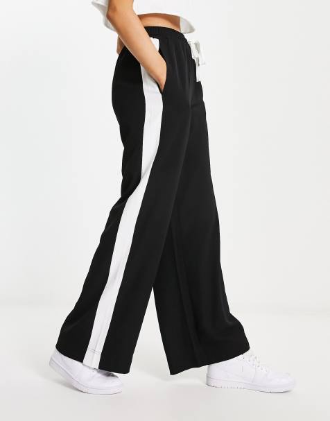 Pantalones negros sin cierres con panel en contraste de ASOS DESIGN - view 1