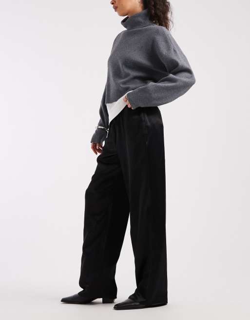 Pantalones negros sin cierres de pernera ancha de satén de ASOS DESIGN, 2 de 5