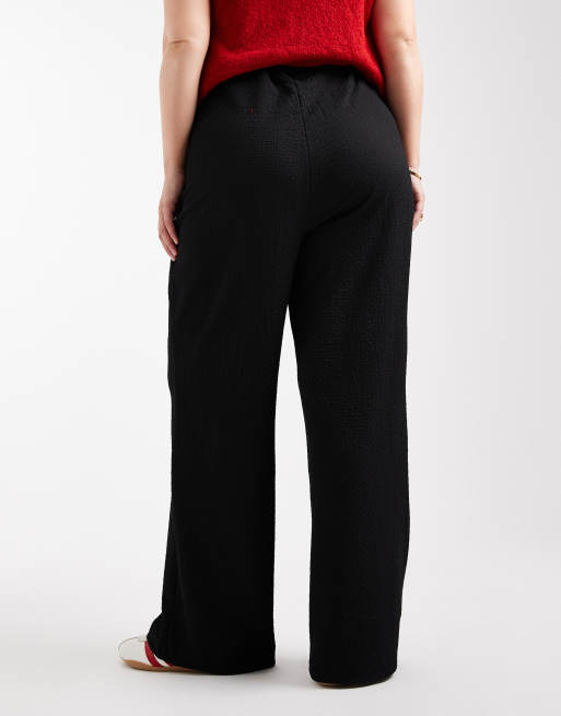 Pantalones negros sin cierres de punto liso texturizado de Vero Moda Curve, 4 de 5