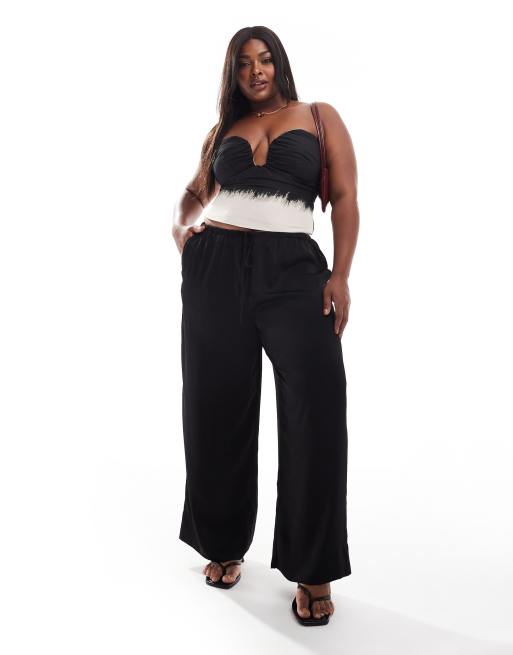 Pantalones negros sin cierres de satén de ASOS DESIGN Curve