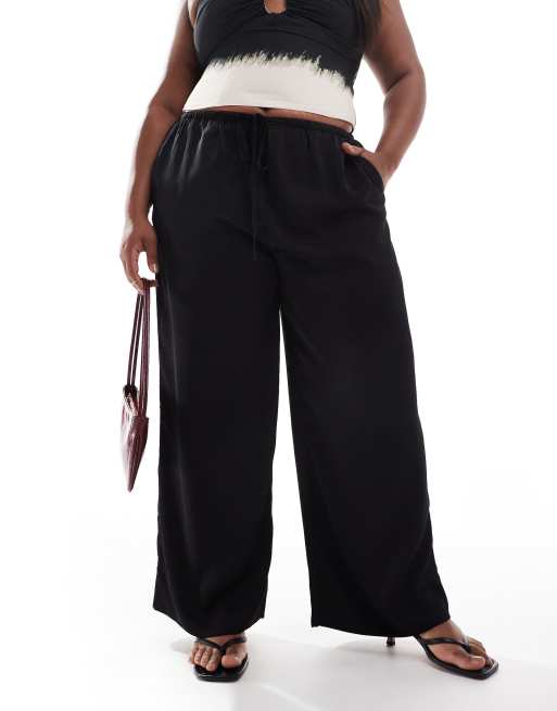 Pantalones negros sin cierres de satén de ASOS DESIGN Curve, 2 de 5