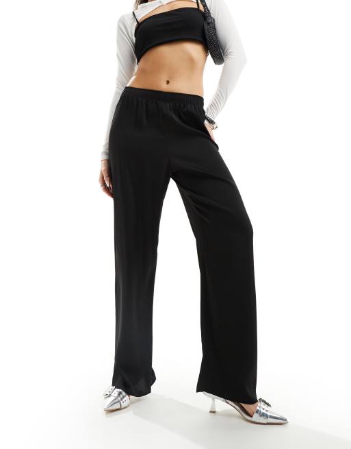 Pantalones negros sin cierres de satén de River Island