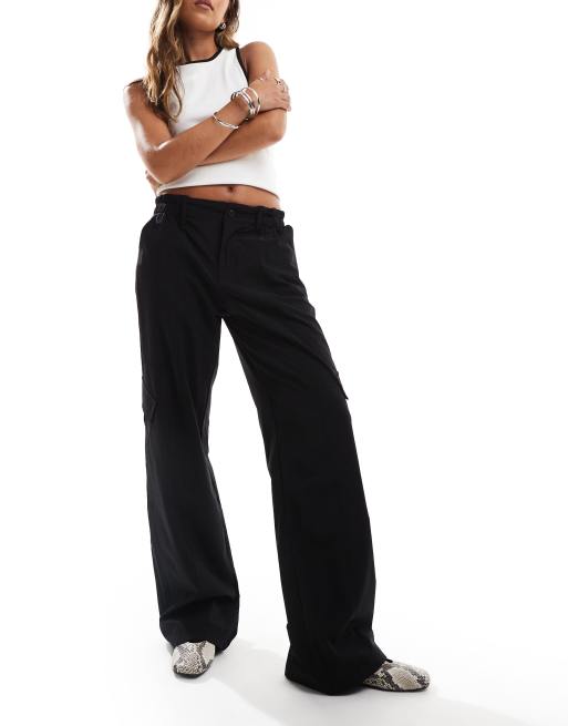 Pantalones negros utilitarios de Sixth June