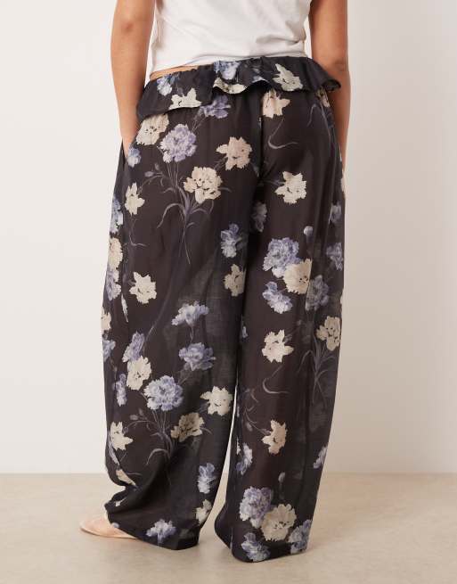 Pantalones negros vaporosos con estampado floral de ASOS DESIGN Curve, 2 de 5