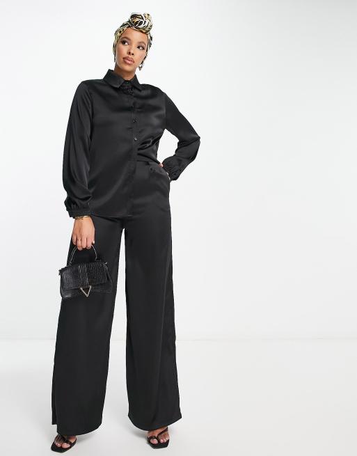 Conjunto negro de top y pantalones palazzo de sat n Modest de