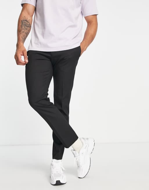 Pantalones pitillo de vestir en negro de River Island