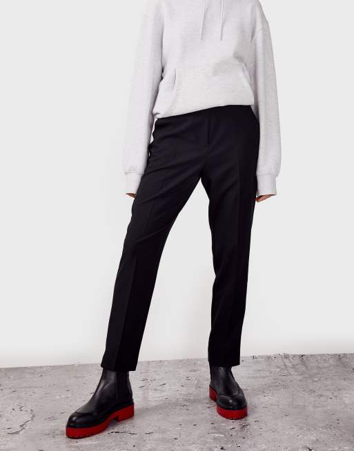 Pantalones pitillo negros de Topshop