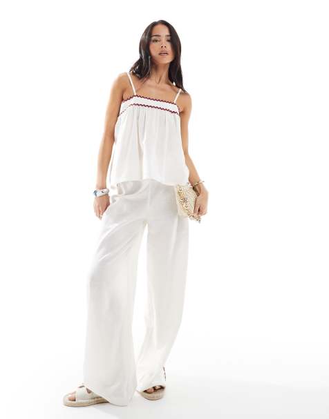 Pantalones playeros blancos con ribetes en zigzag rojos exclusivos de Esmée (parte de un conjunto) - view 1