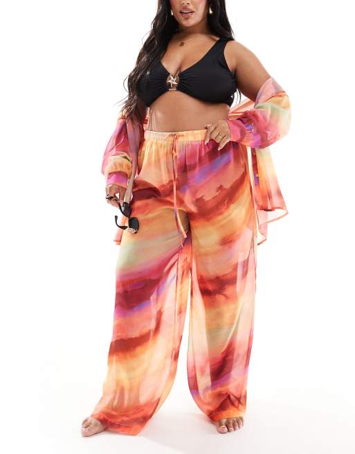 Pantalones playeros naranjas de pernera ancha con estampado degradado de tejido semitransparente exclusivos de In The Style Plus x Perrie Sian (parte de un conjunto)