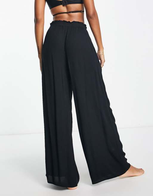 Pantalones playeros negros con cordón ajustable exclusivos de Iisla & Bird  , 4 de 4