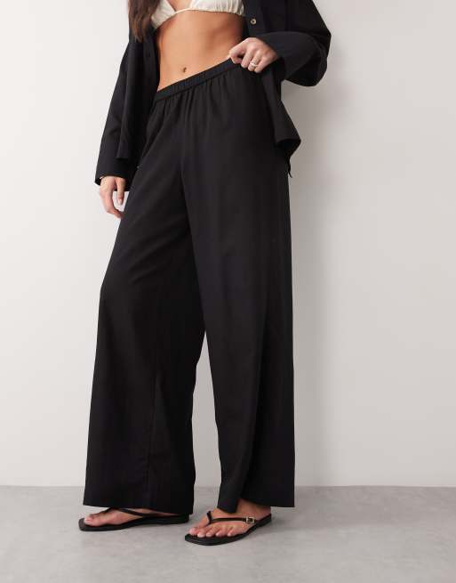 Pantalones playeros negros transparentes de mezcla de lino Ipanema de ASOS DESIGN, 2 de 5