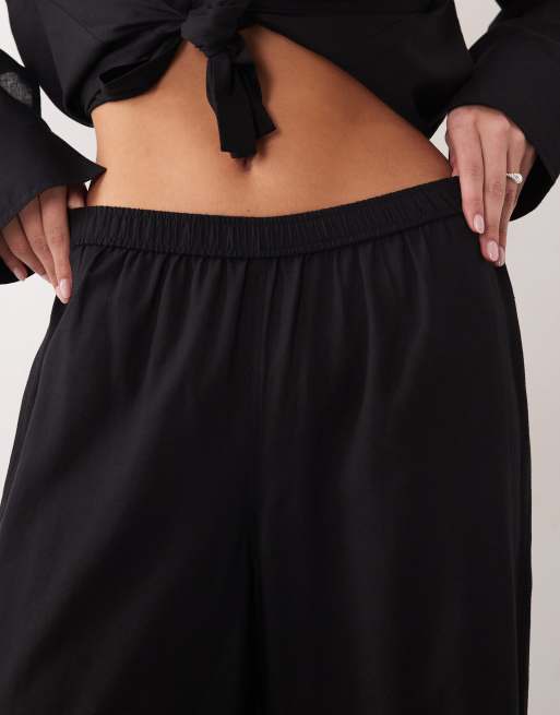 Pantalones playeros negros transparentes de mezcla de lino Ipanema de ASOS DESIGN, 5 de 5