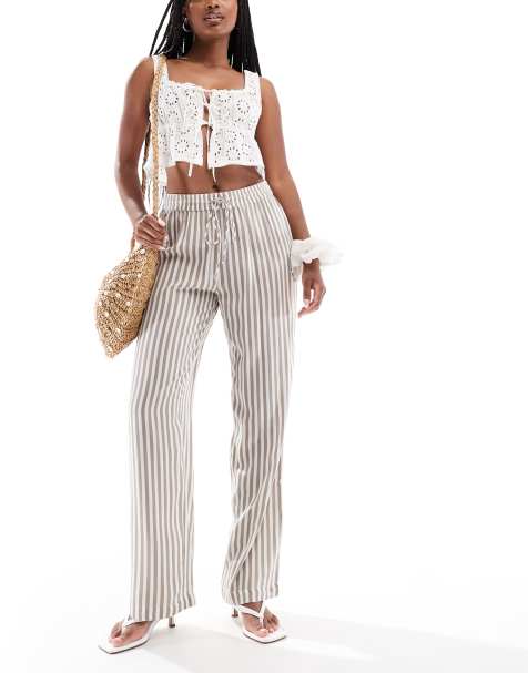 Pantalones roca lunar y blanco a rayas de talle alto y pernera ancha de Pieces - view 1